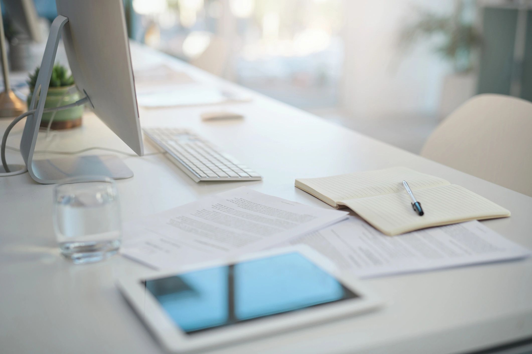 Organized office desk with documents and workspace essentials